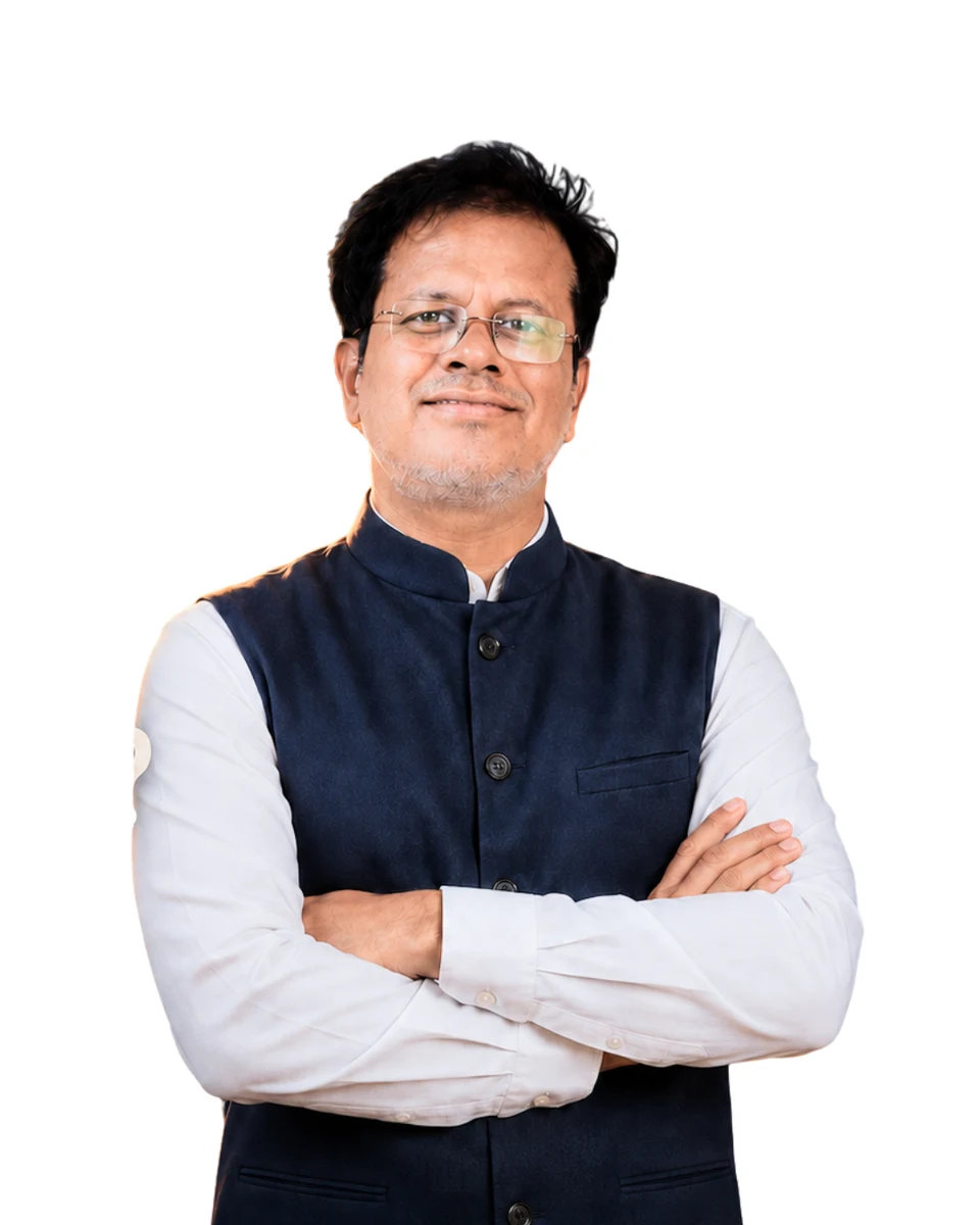 Chirag Modi wearing a navy jacket over a white shirt